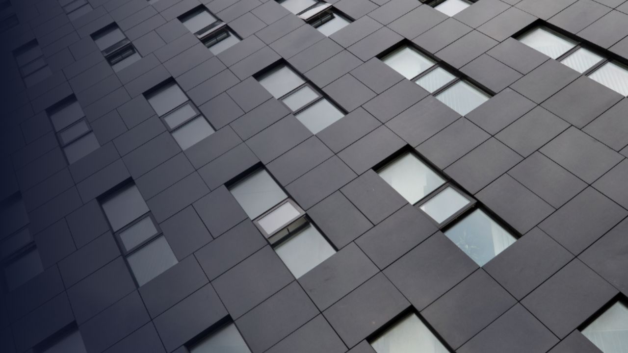 types of building facades - Modern office building with aluminium rainscreen cladding panels and glazed curtain wall façade system.